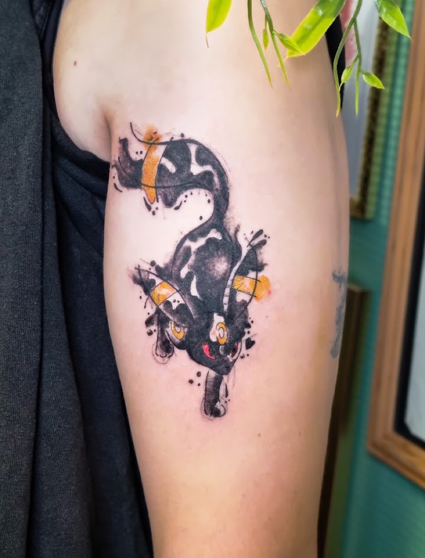 Tatouage Noctali en couleur réalisé par Erika, Phanpy Ink, Villefranche-sur-Saône